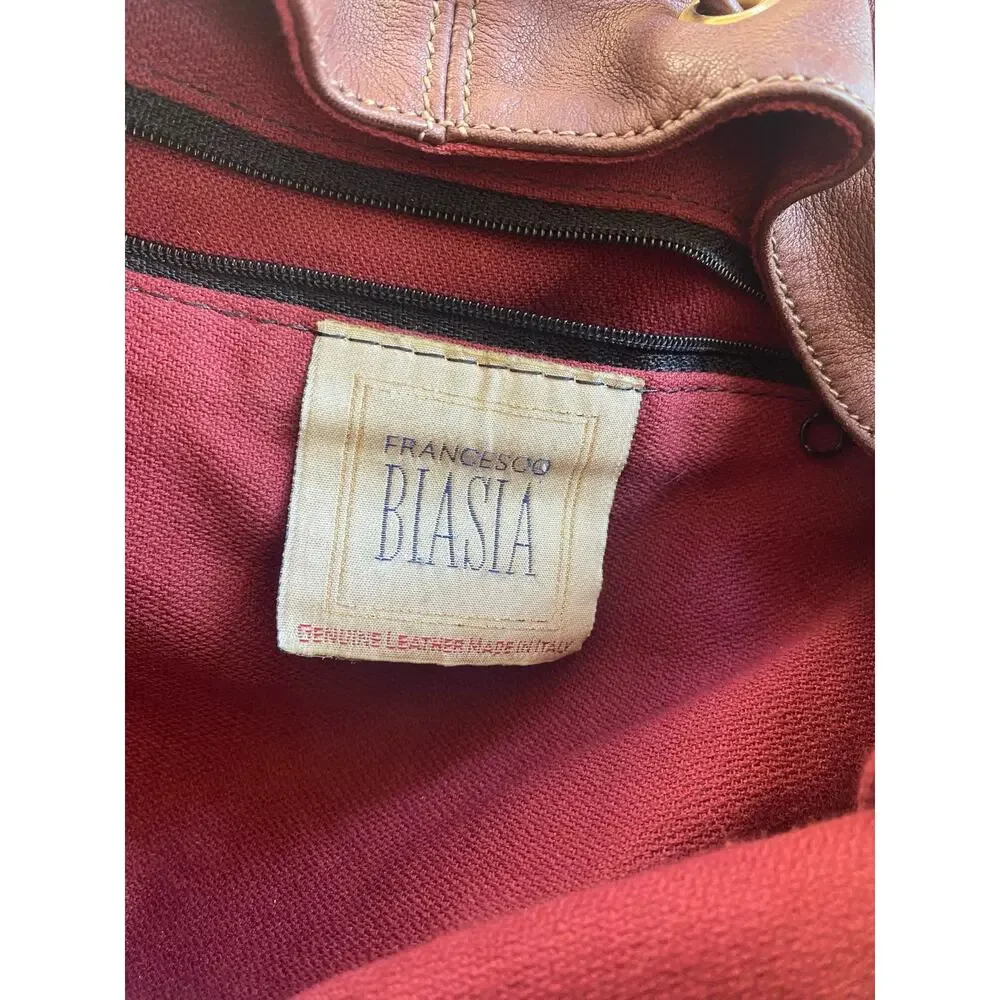 Francesco Biasia brown leather backpack bucket style pockets unisex